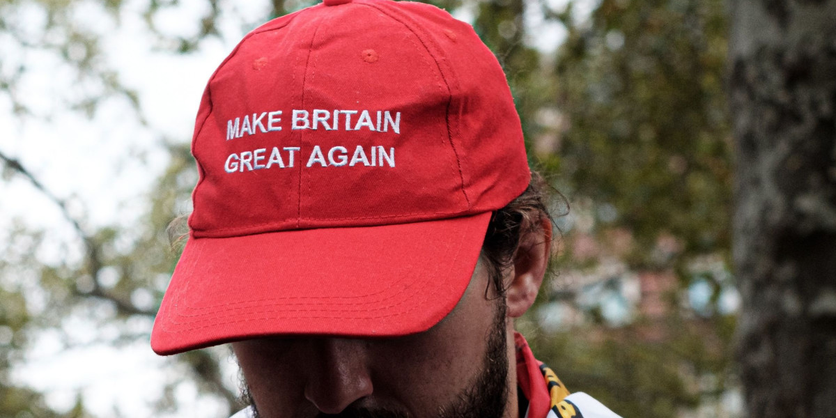 man wearing make britain great again hat